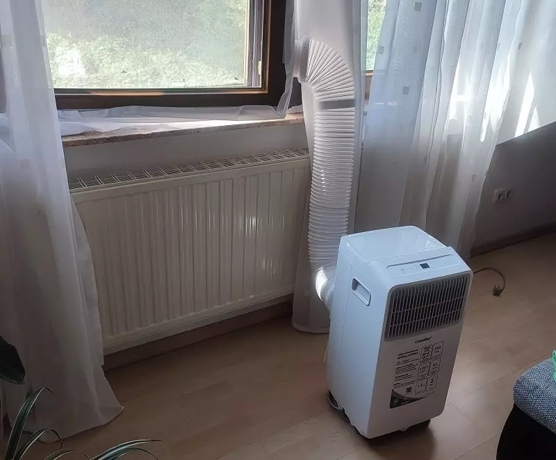 portable air conditioner installed at a window