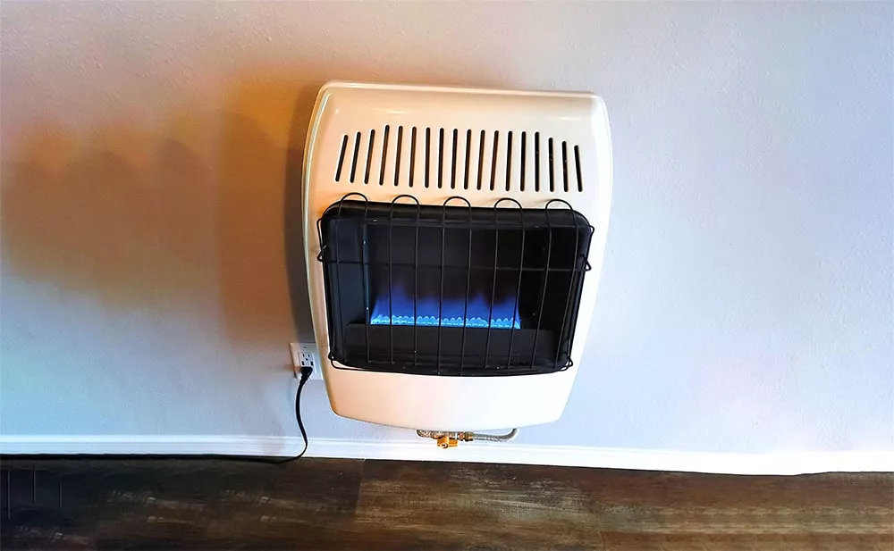 dyna-glo propane heater on wall