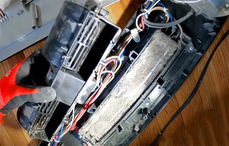 lasko ceramic heater disassembled clogged with dust