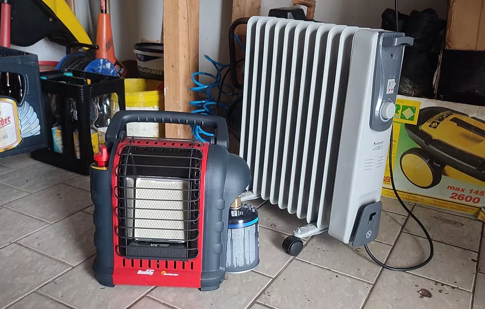 propane heater mr heater buddy and oil-filled radiator space heater in garage