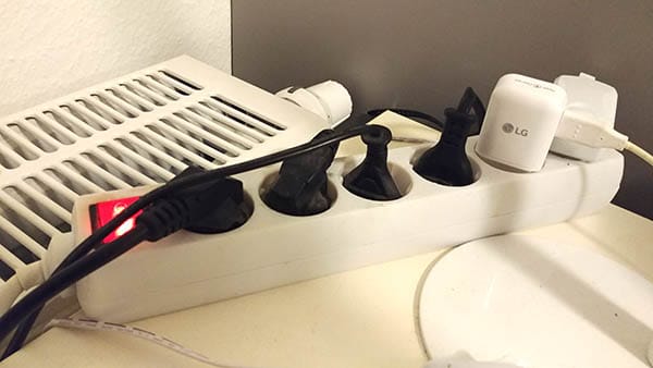 power strip with multiple space heaters plugged into a timer