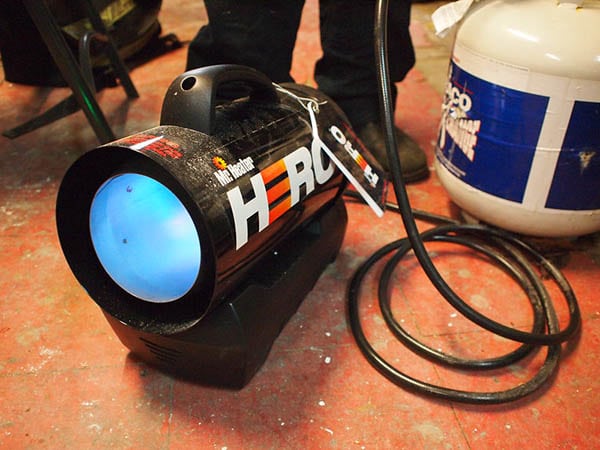 propane torpedo heater to heat a garage without insulation